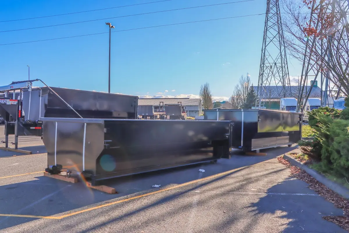 Roll-off dumpster ready for waste disposal at job site for Yard Waste Dumpster Rental in Raritan